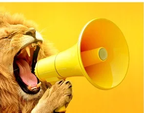 Lion roaring into a yellow megaphone